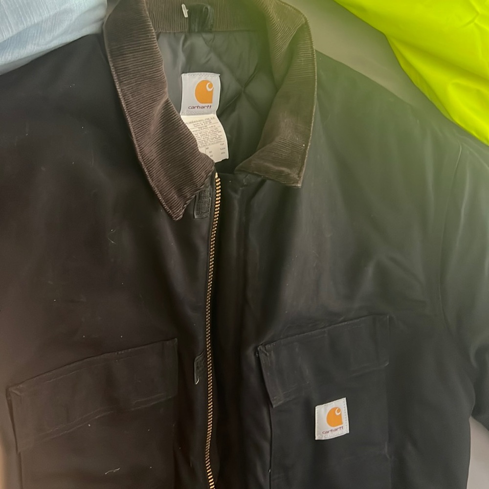 Black jacket just like new. Lost tag. Never worn.